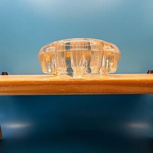 Vintage clear footed flower frog 13 hole excellent condition. Great for marbles